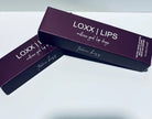 LOXX LIPS Peptide Lip Gloss Toxxic Kiss Berry Tint packaging on a clean background.