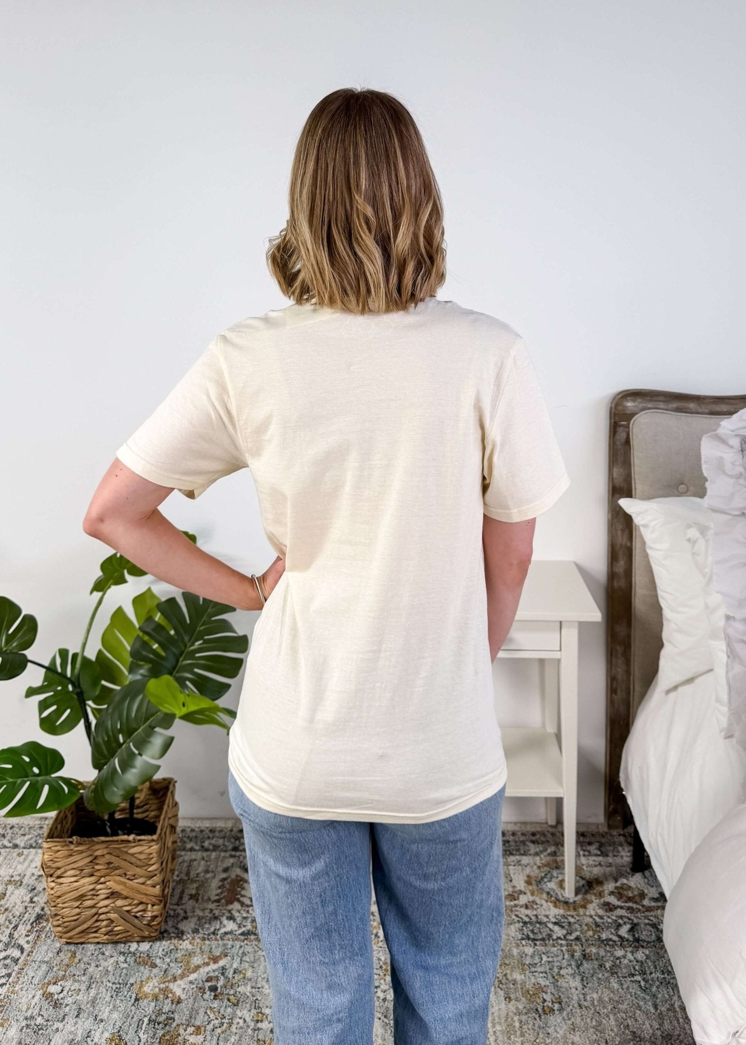 Cream Crew Fit Graphic Tee side profile on model back profile