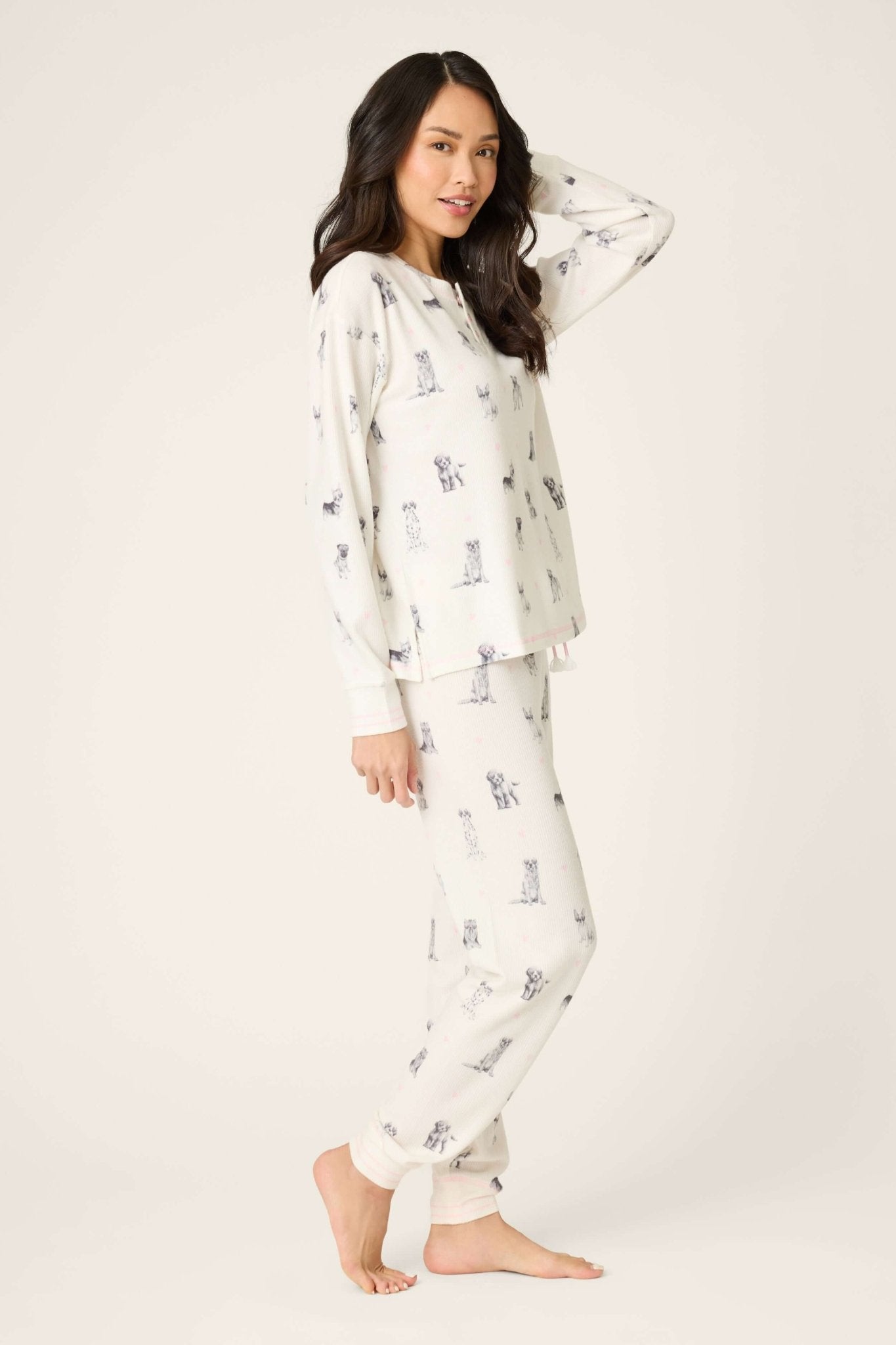 Model wearing My Dog is my Valentine Peachy Jersey Jogger Set PJ Salvage, showcasing playful dog print on loungewear.