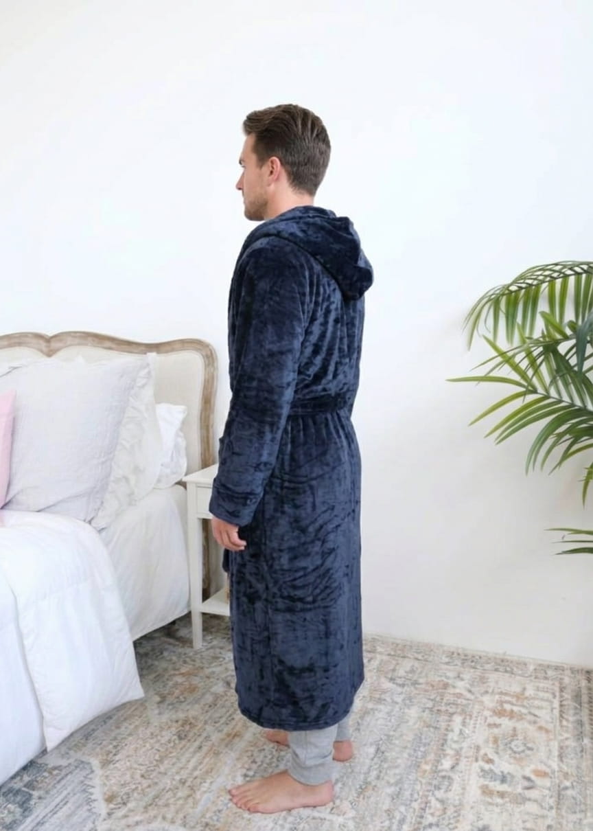 Long Navy Hooded Fleece Robe on male model in bedroom setting side view - Cloud Nine Pajamas