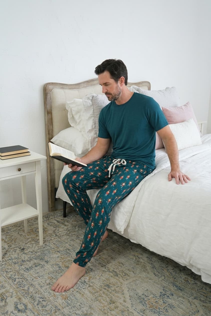 Bob's Sleepwear Co. Nutcracker Teal Bamboo Jogger Pant lifestyle on model — Cloud Nine Pajamas Edmonton