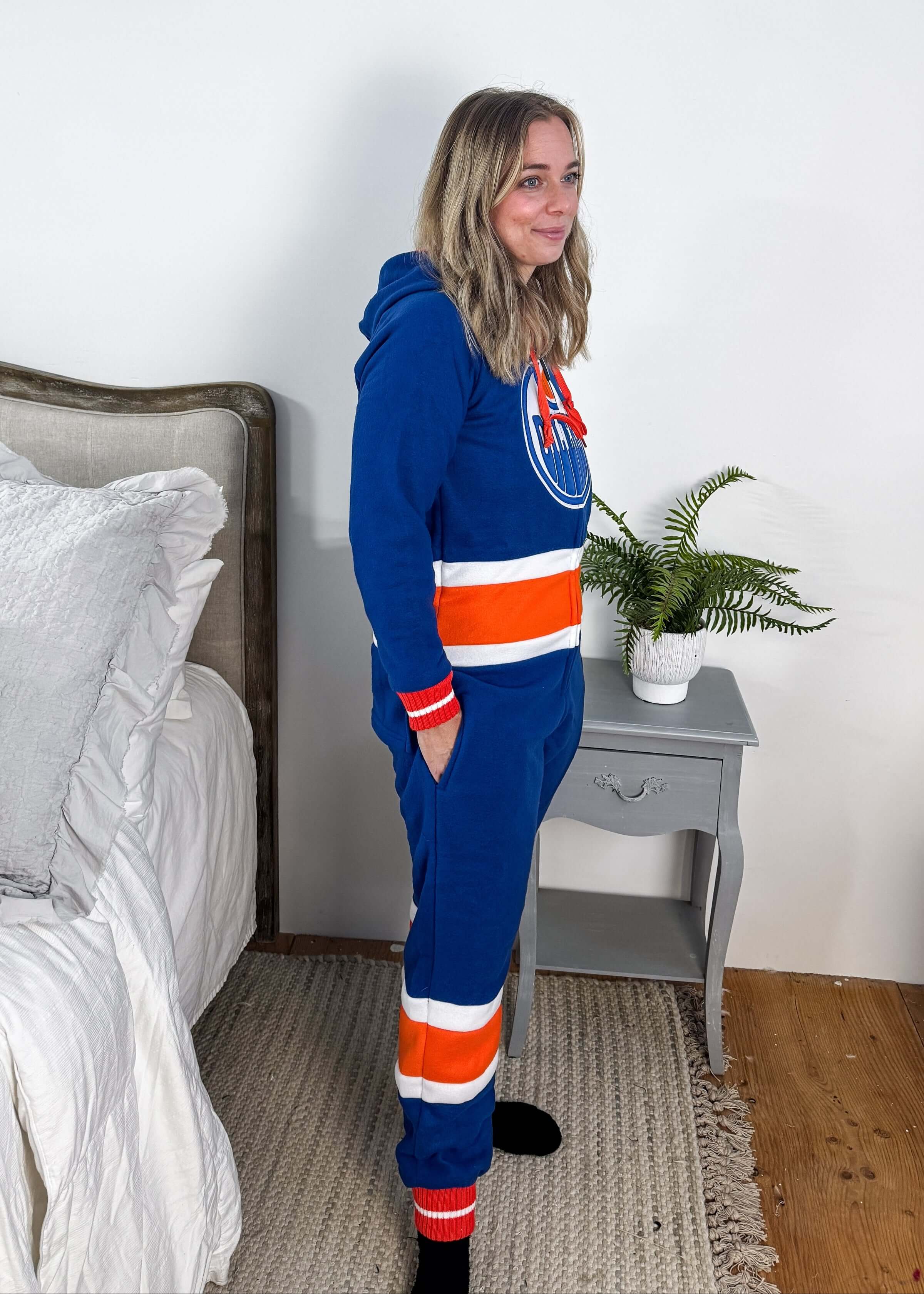 classic blue and orange side view of NHL Oilers fleece onesie