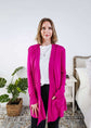 Woman wearing a bright pink cardigan in a bedroom setting Scarlett Ellie Summer Open Lightweight Cardigan | Cloud Nine Pajamas