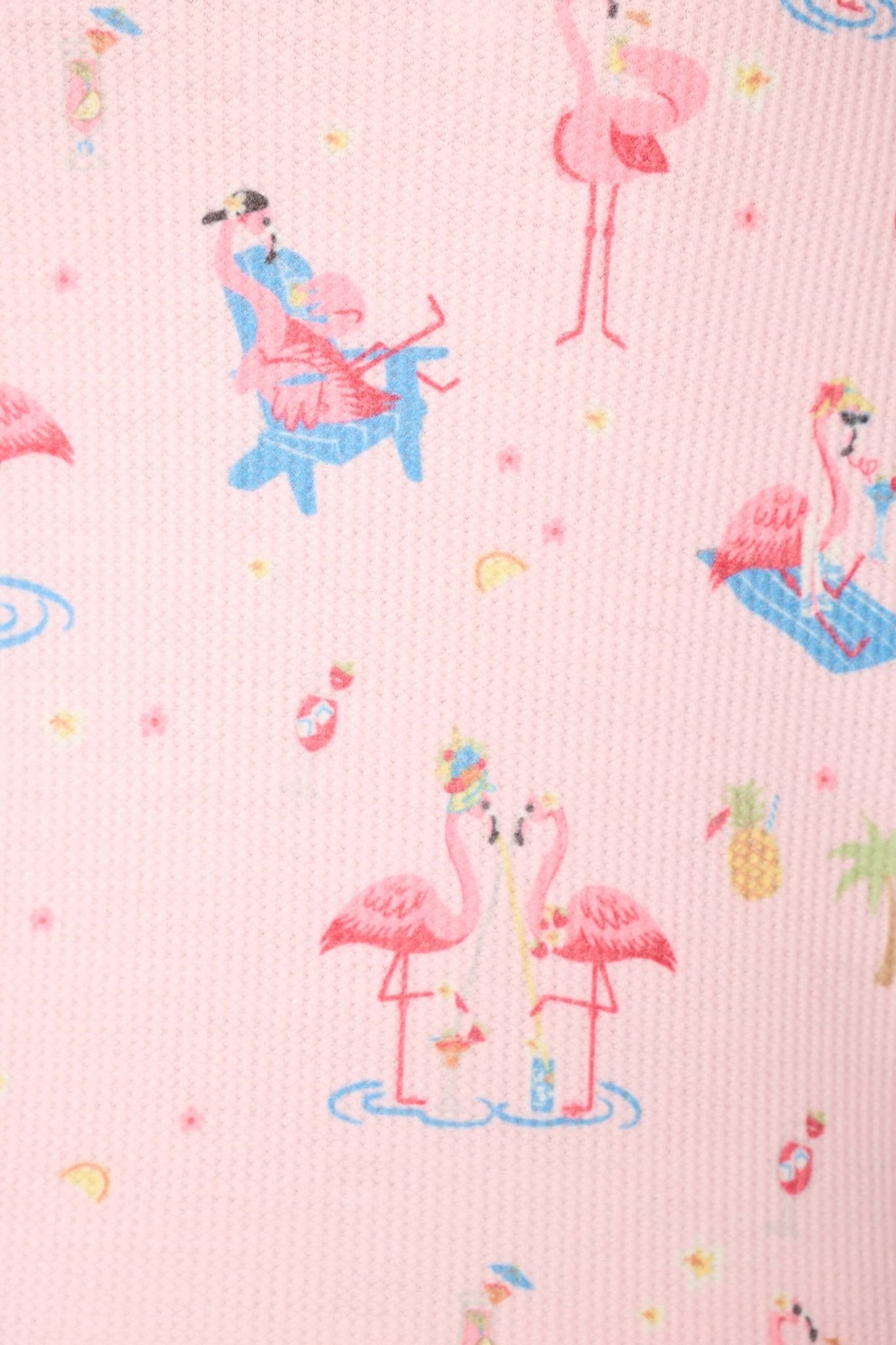 Pattern of playful flamingos in colorful designs on a pink waffle-knit fabric for PJ Salvage - Boyfriend Peachy Waffle Tank & Boxer Set.