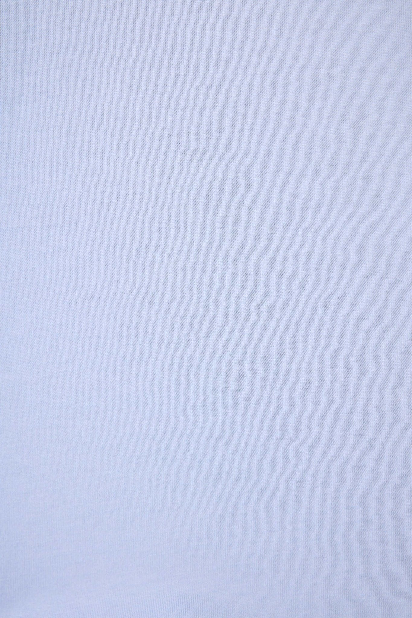 PJ SALVAGE Graphic Print Softee Tee & Short Lounge Set in "Nap Time is my Happy Hour" graphic tee shirt in light blue. Close up of the Fabric showing texture and colour of the softee set