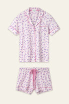 PJ Salvage Whimsy Button Up & Short Short Set in pink and purple floral print on a light background.