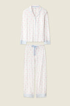 Playful Prints Cotton-Modal Long Sleeve Pajama Set by PJ Salvage displayed on a beige background.