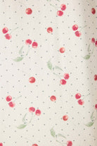 Polka Dot Cherries Peachy Jersey Pajama Set PJ Salvage fabric featuring red cherries on a polka dot background.