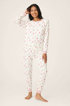 Polka Dot Cherries Peachy Jersey Pajama Set PJ Salvage modeled by a woman, featuring cherry and polka dot prints.