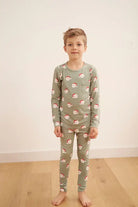 Santa Kids Classic Bamboo Jogger PJ Set featuring a child in festive Santa print pajamas.