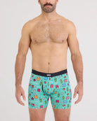 Model wearing Vibe Xtra Soft Comfort Boxer Brief in playful print featuring ice cream and drinks.