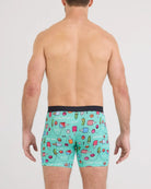 Back view of a man wearing Vibe Xtra Soft Comfort Boxer Brief with colorful food-themed prints.