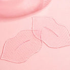 Served Chilled Rosé Lips Gels hydrogel masks on pink background for a refreshing lip treatment.