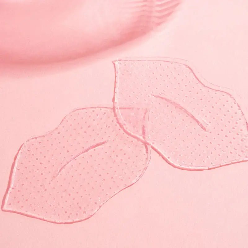 Served Chilled Rosé Lips Gels hydrogel masks on pink background for a refreshing lip treatment.