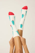 Sleigh All Day Socks featuring tree print and cozy grippers, perfect for winter comfort by PJ Salvage.