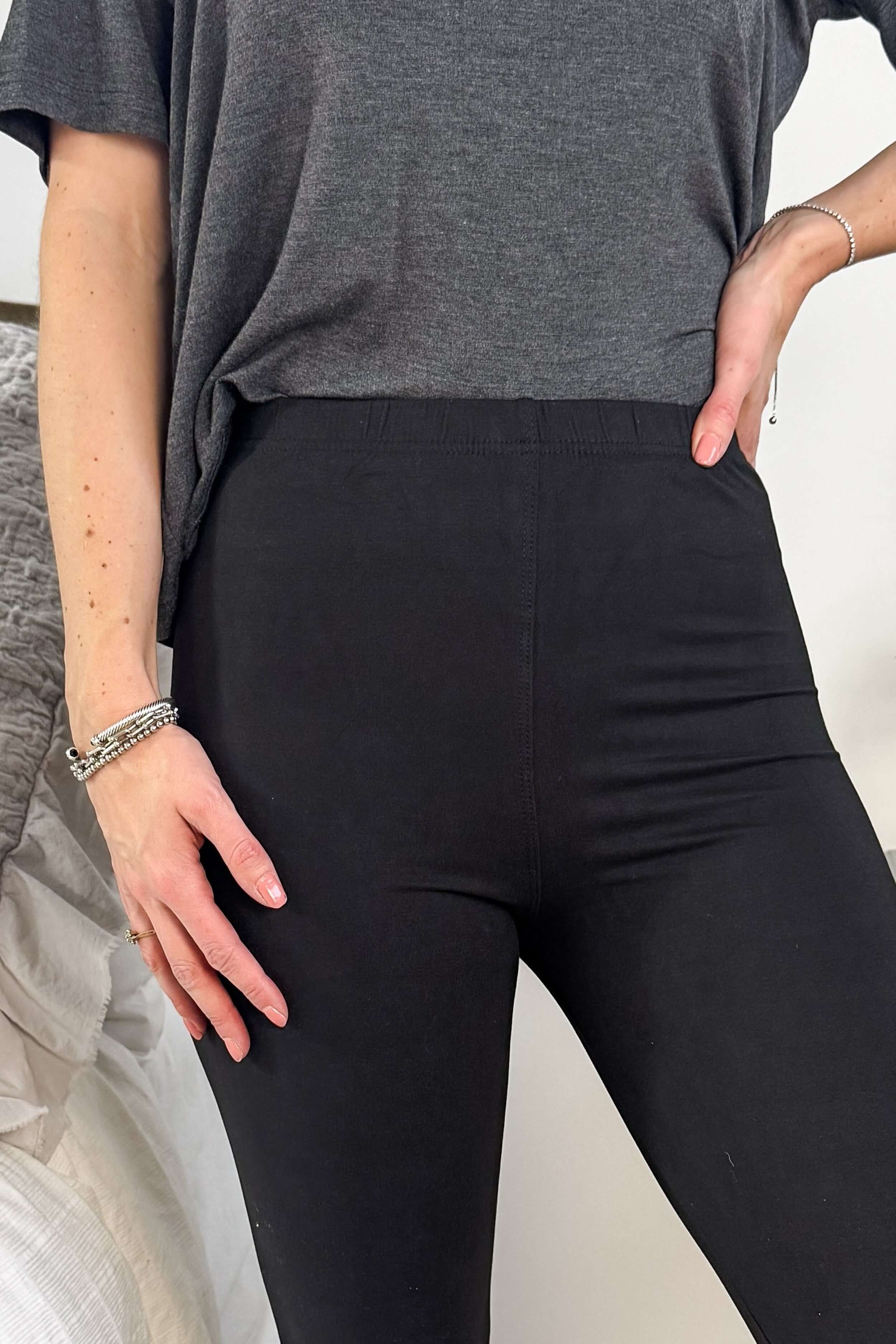 Solid Black Regular Rise Buttery Soft Leggings | O/S fits women XS-L close up of rise/crotch fit