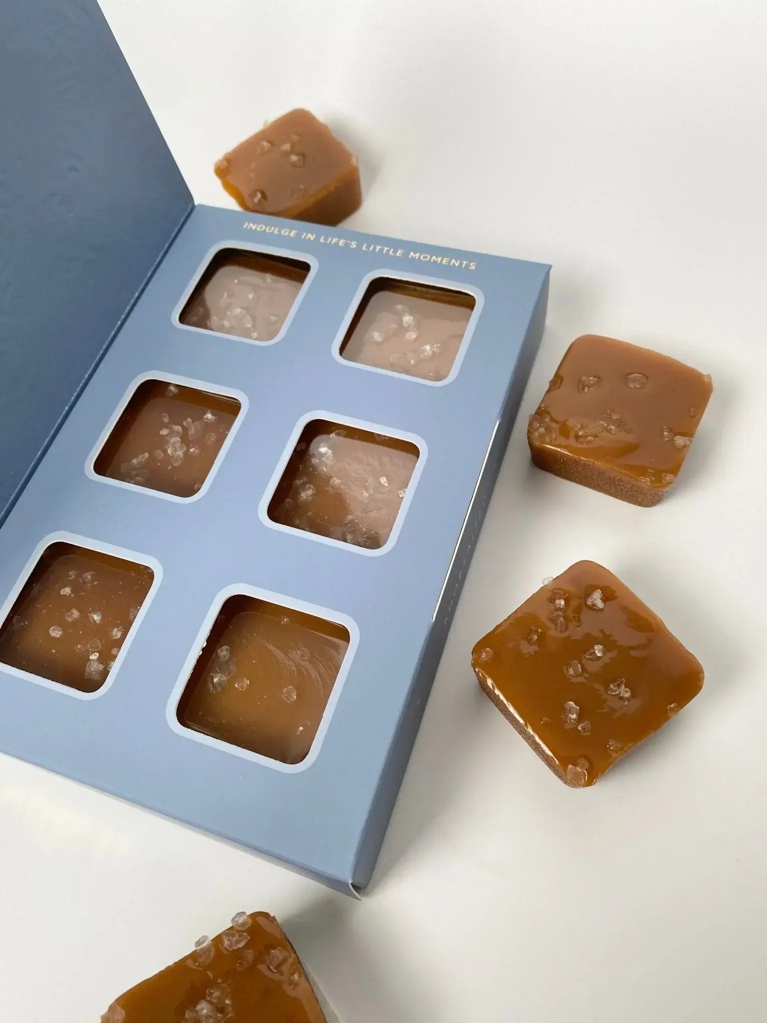 6-piece box of traditional salted caramels in blue gift box