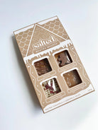 The Winter Whimsy Holiday Caramel Mix - 4 Piece Box featuring assorted flavors by Salted.