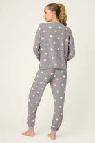 women's thermal waffle pj set with star print and charcoal grey background. Long sleeve top with buttons and Jogger bottoms by PJ Salvage