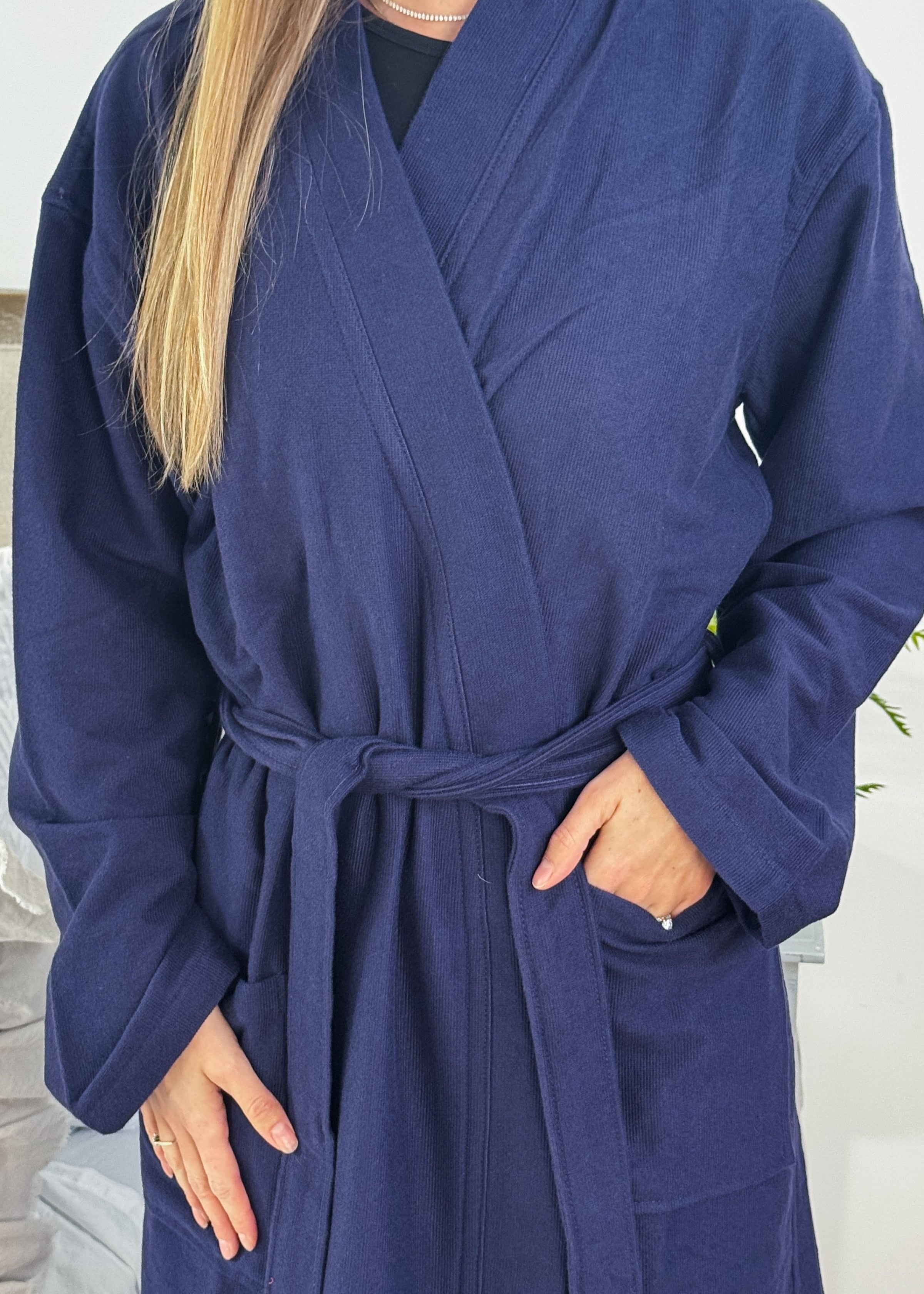 Unisex Cotton Terry robe in night blue, featuring a belt and pockets, perfect for relaxing at home.