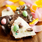 Utoffeea Canada Handcrafted Toffee variety featuring chocolate toffee with colorful Easter egg toppings.