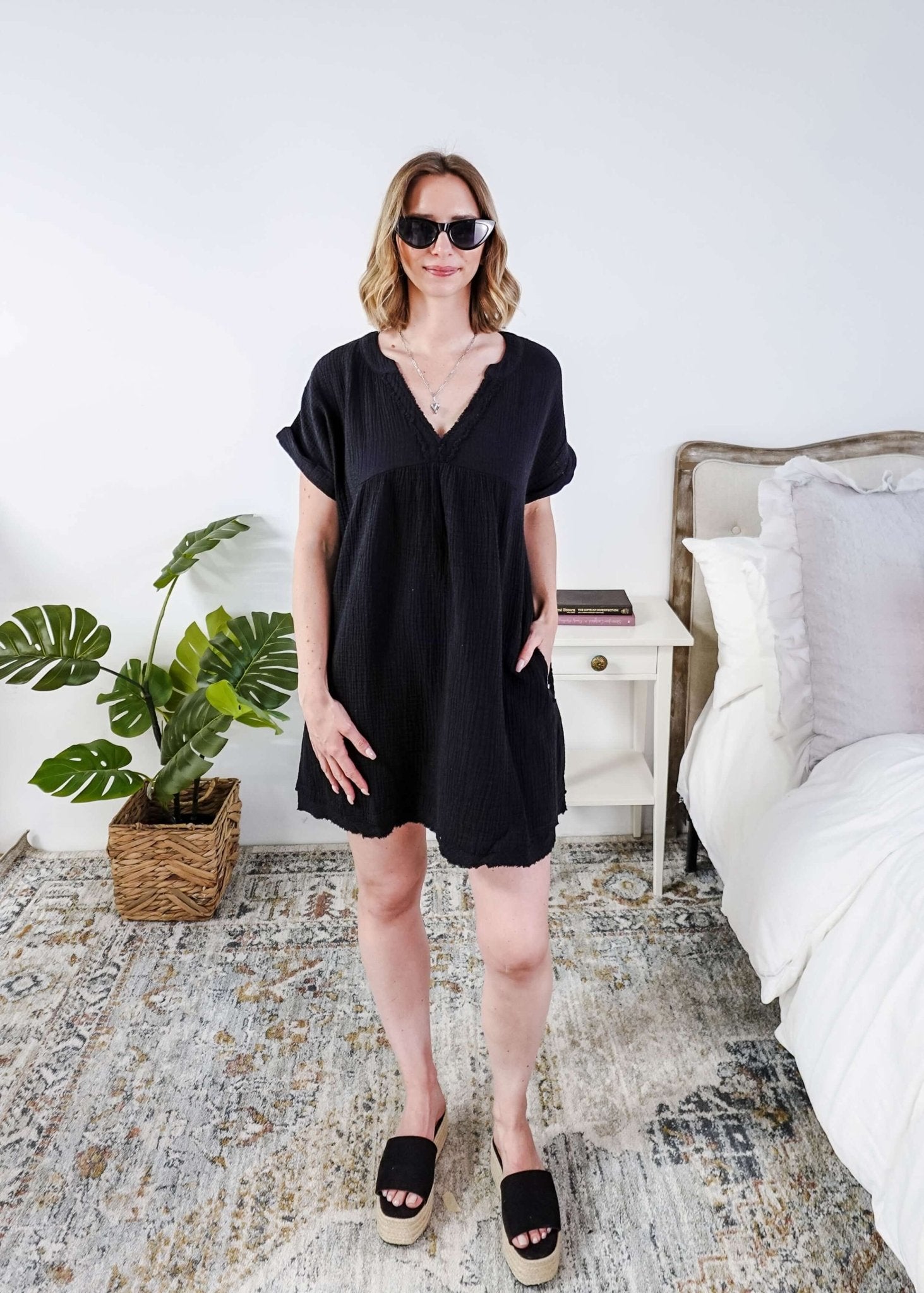 women in light weight gauze cotton black dress Scarlett Ellie V-Neck Gauze Dress | Lightweight Summer Dress | Cloud Nine Pajamas showing full length on model