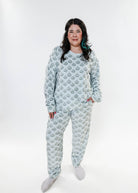 Cozy Pine Long Sleeve Jogger Velour Lounge Set modeled by a woman with long dark hair, showcasing soft fabric and comfort.