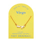 Zodiac Script Necklace in 14K Plated Gold featuring the Virgo astrological sign in elegant script on a yellow background.