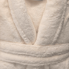 warm buddy plush robes folded showing texture cream robe