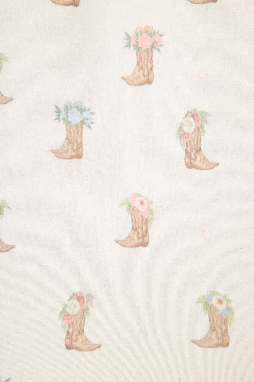 Western Blooms Boot Bouquet pattern featuring floral cowboy boots on an ivory background.