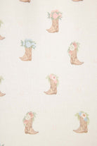 Western Blooms Boot Bouquet pattern featuring floral cowboy boots on an ivory background.