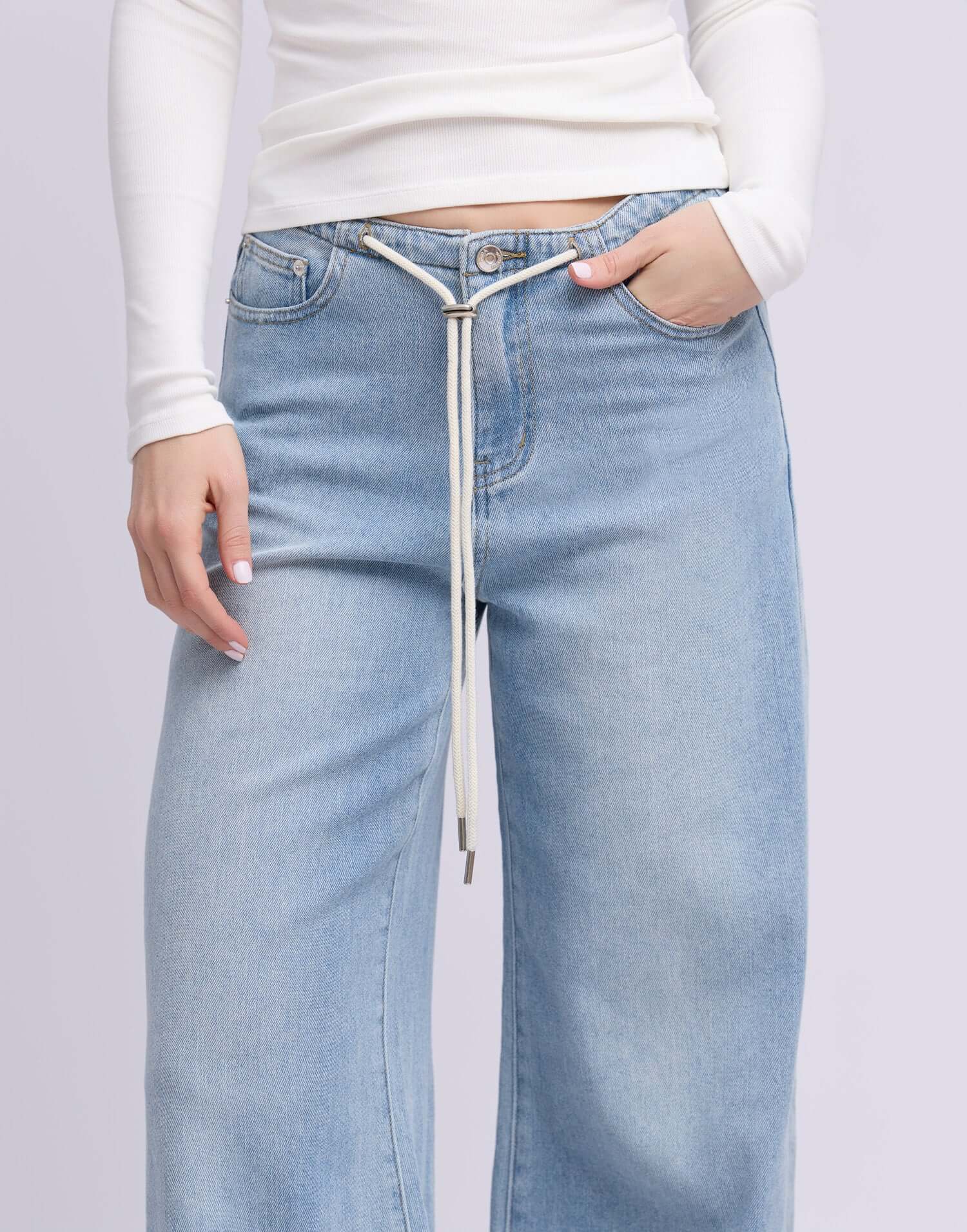 Yoga Jeans LILY Wide Leg Drawstring Jeans in light blue with a stylish drawstring detail.