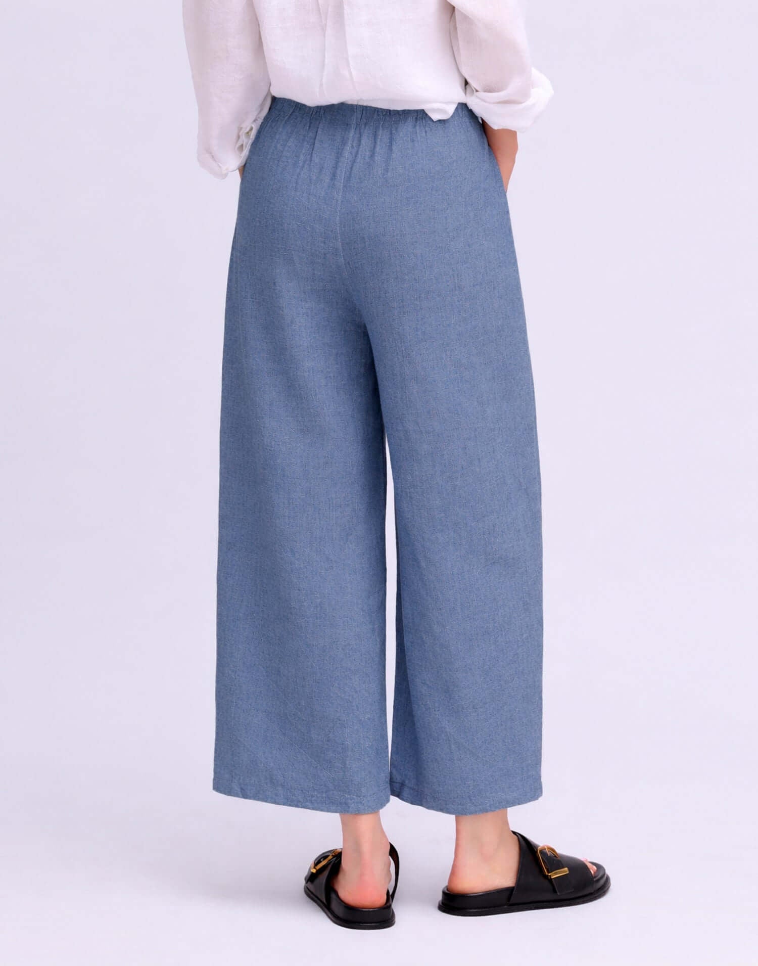 Back view of YOGA JEANS Sofia Linen Wide Leg Pant showcasing its relaxed fit and comfortable design.