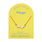 Zodiac Script Necklace in 14K Plated Gold featuring the Virgo astrological sign in elegant script on a yellow background.